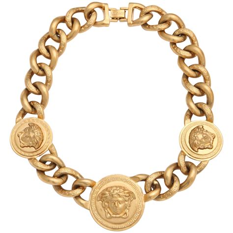 gold versace diamond pendant|Versace gold chain and pendant.